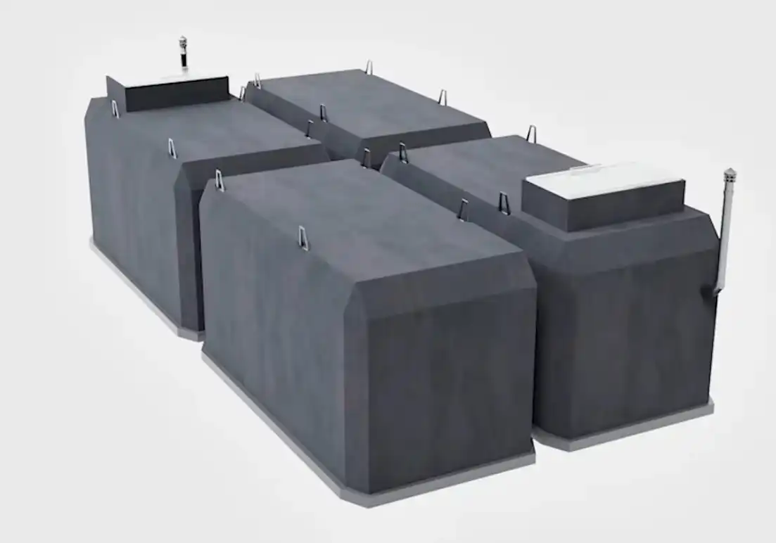 Six large gray industrial storage tanks arranged in a row with top hatches and small ladders, forming a tank farm view.